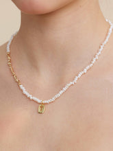 wearing Custom Ember Initial Pearl Necklace